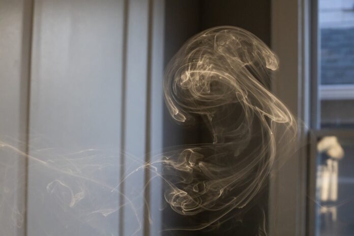 A high-definition image of smoke. Depiction of addiction